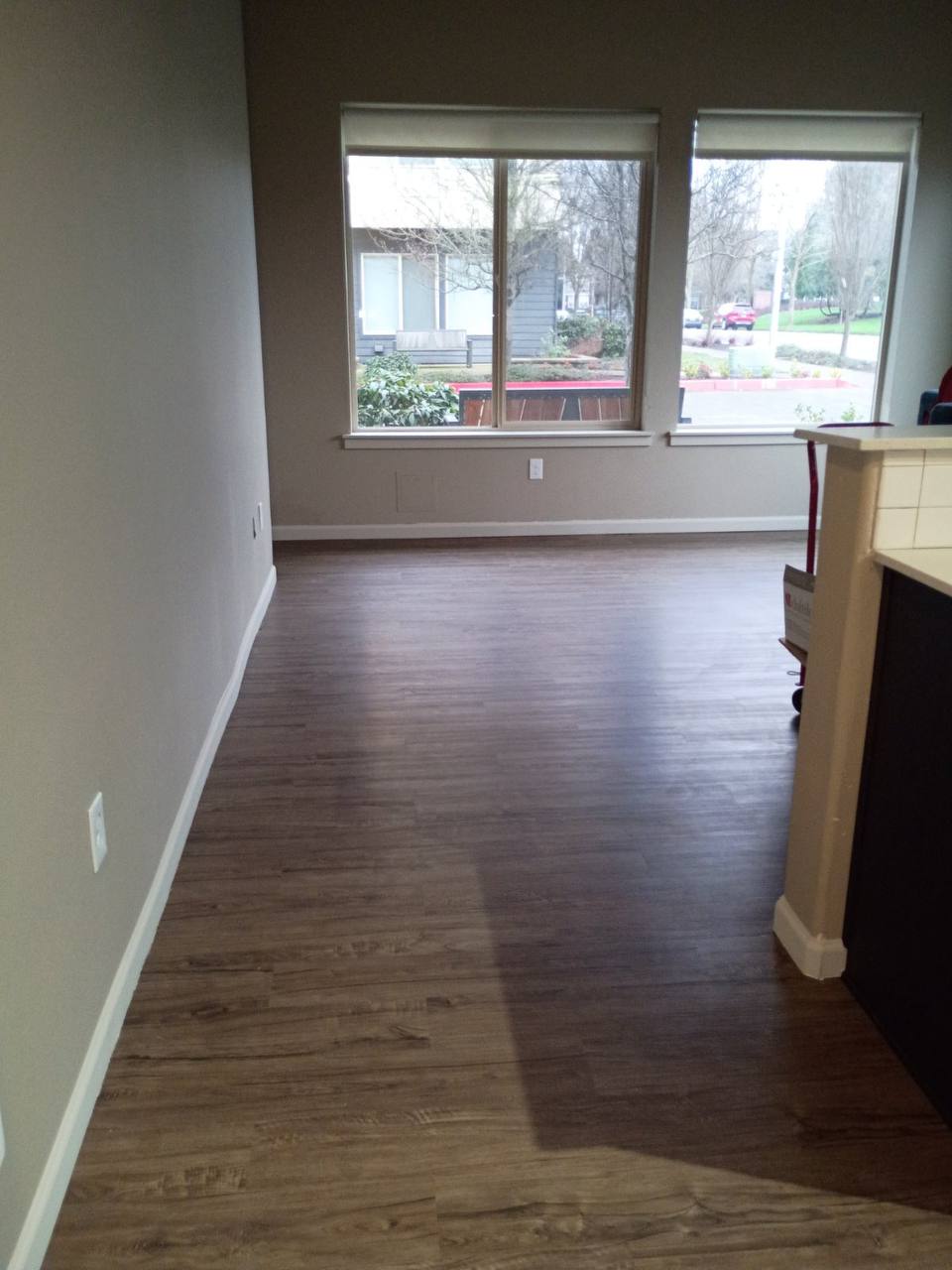 Clean living space with hardwood floors